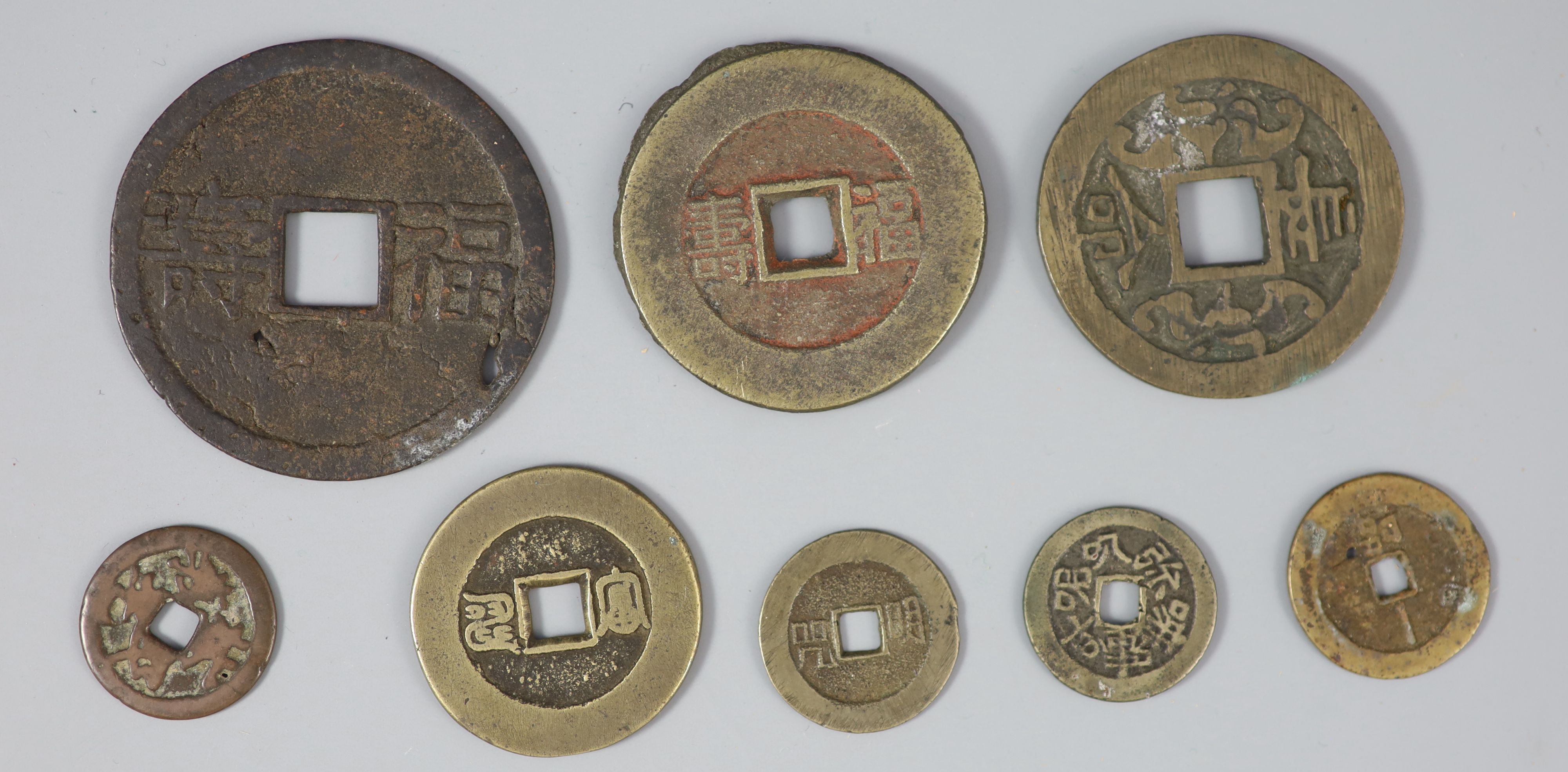 China, 8 bronze charms or amulets, Qing dynasty,
